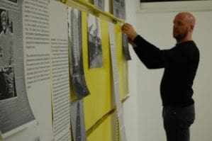 installing archive materials for Iniva's Social Fabric exhibition